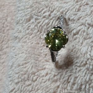 Ring with green/yellow stone $8 or, 3 for $20